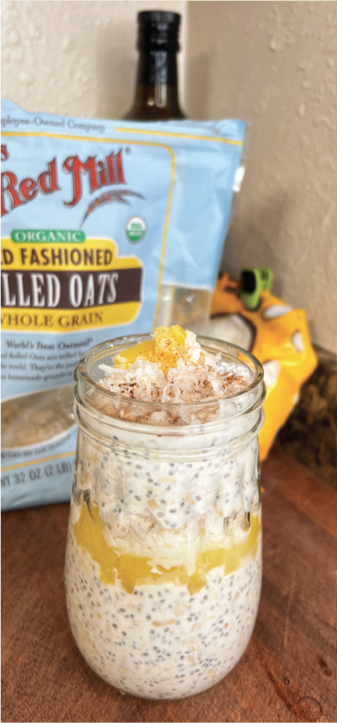 Layered overnight oats with chia and mango in a glass jar